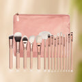 Canvia makeup — rose gold brush set on a warm beige backdrop
