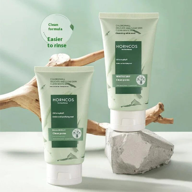Two bottles of Horncos skincare products on a light green background with wooden elements.