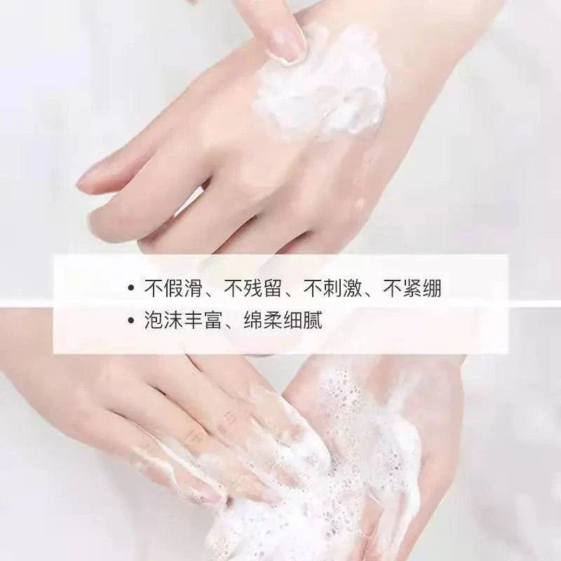 Hands with soap bubbles on a white background