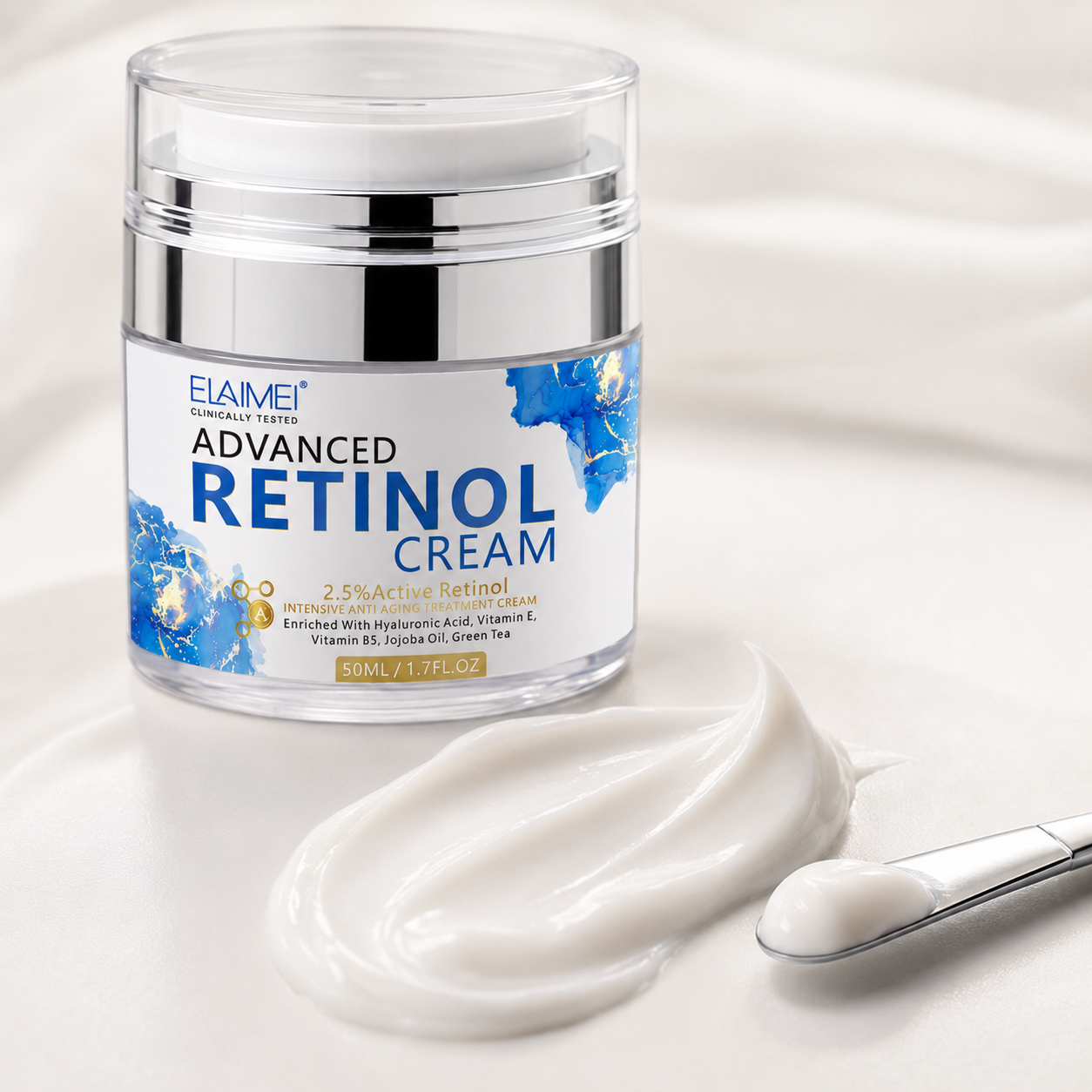 Advanced Retinol Cream with rich white cream texture and cosmetic spatula