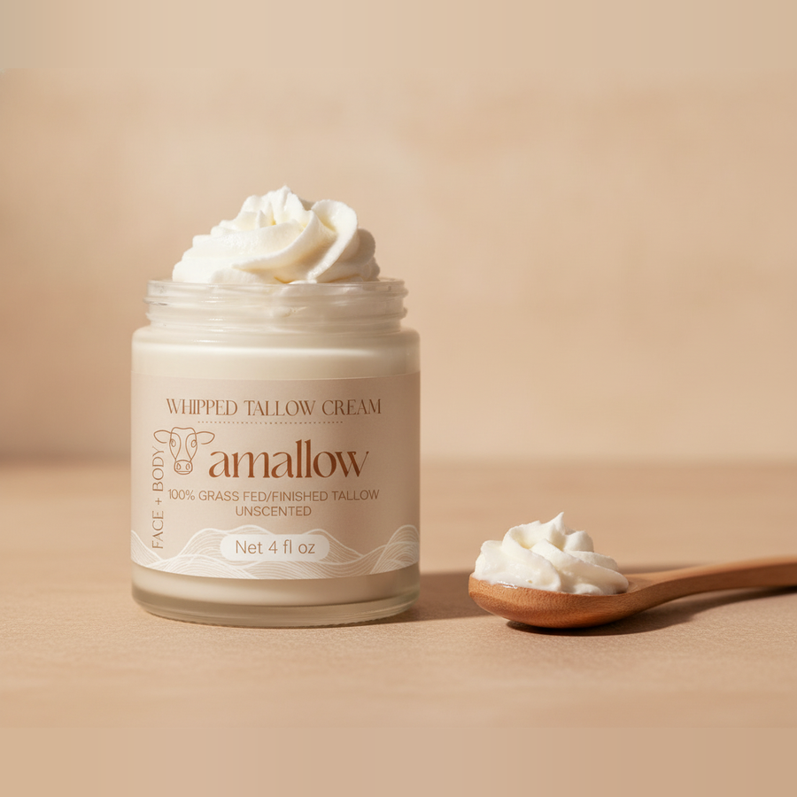 Whipped Tallow Cream — styled three-quarter angle with wooden spoon