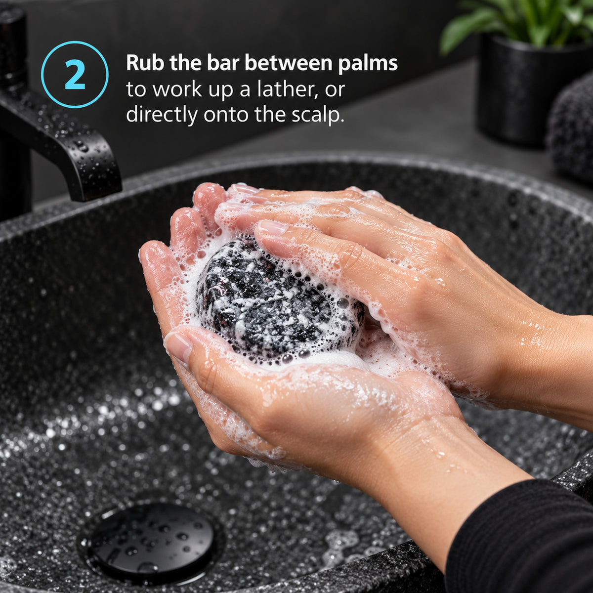 Step 2: rub the shampoo bar between palms to work up a lather