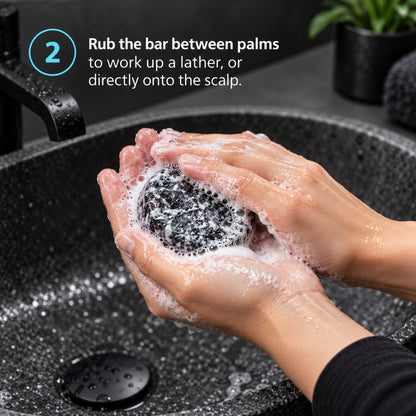 Step 2: rub the shampoo bar between palms to work up a lather