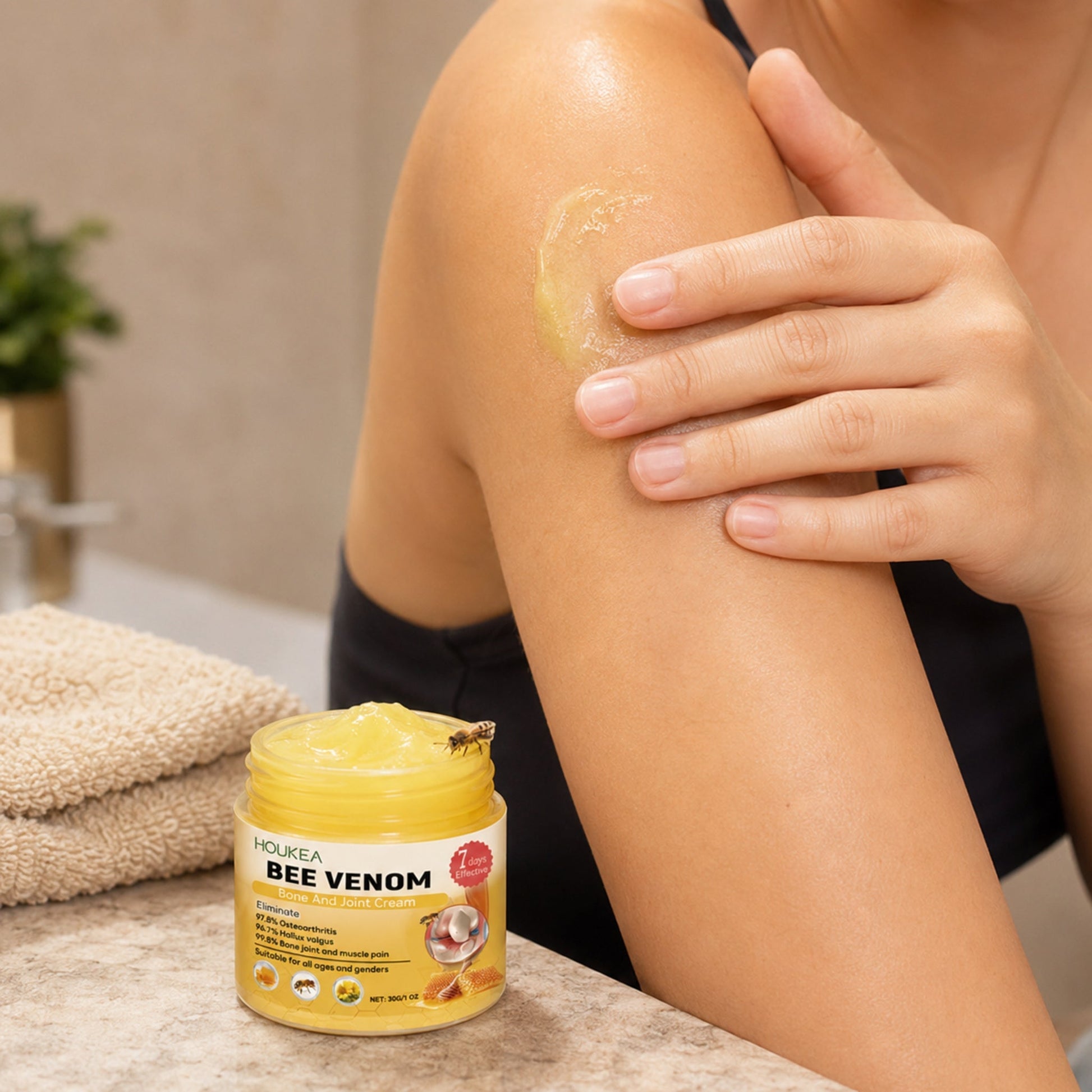 Bee Venom Warming Body Massage Cream applied during a realistic massage