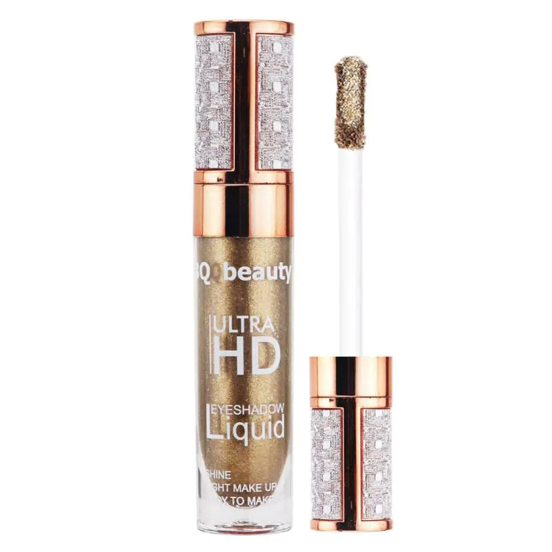 Close-up of liquid glitter eyeshadow tube with soft-tip applicator