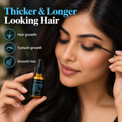 Woman applying castor oil to her lashes with the included spoolie wand – hair growth, eyelash growth, smooth hair