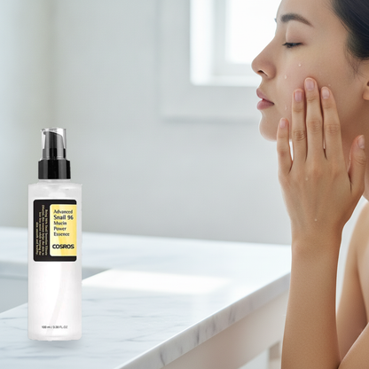 Snail 96 Mucin Power Essence — pressing and patting the essence into freshly cleansed skin