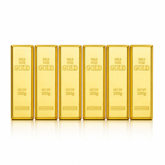 Six gold-bar lipstick cases alone on white with soft realistic studio shadows