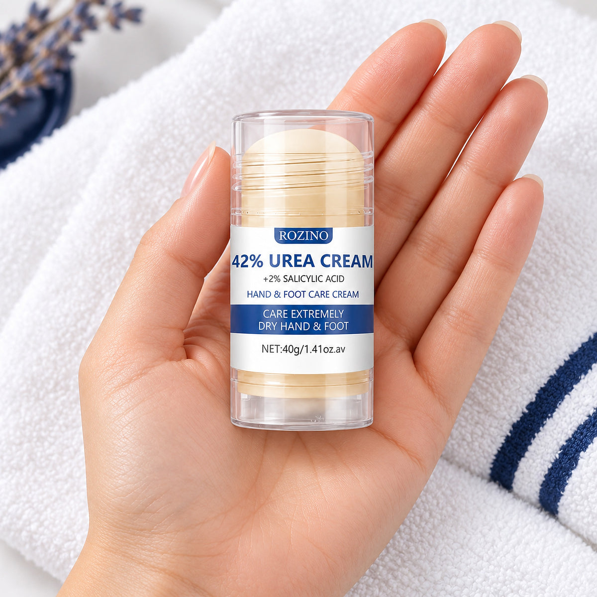 Compact 40 g Rozino urea cream stick held in the palm of a hand