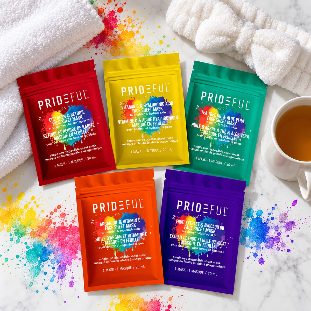 Flat lay of the five face sheet mask sachets with towel, headband and tea