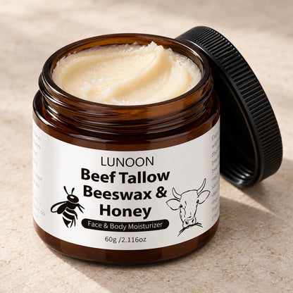 Open jar showing the rich off-white tallow, beeswax and honey balm texture