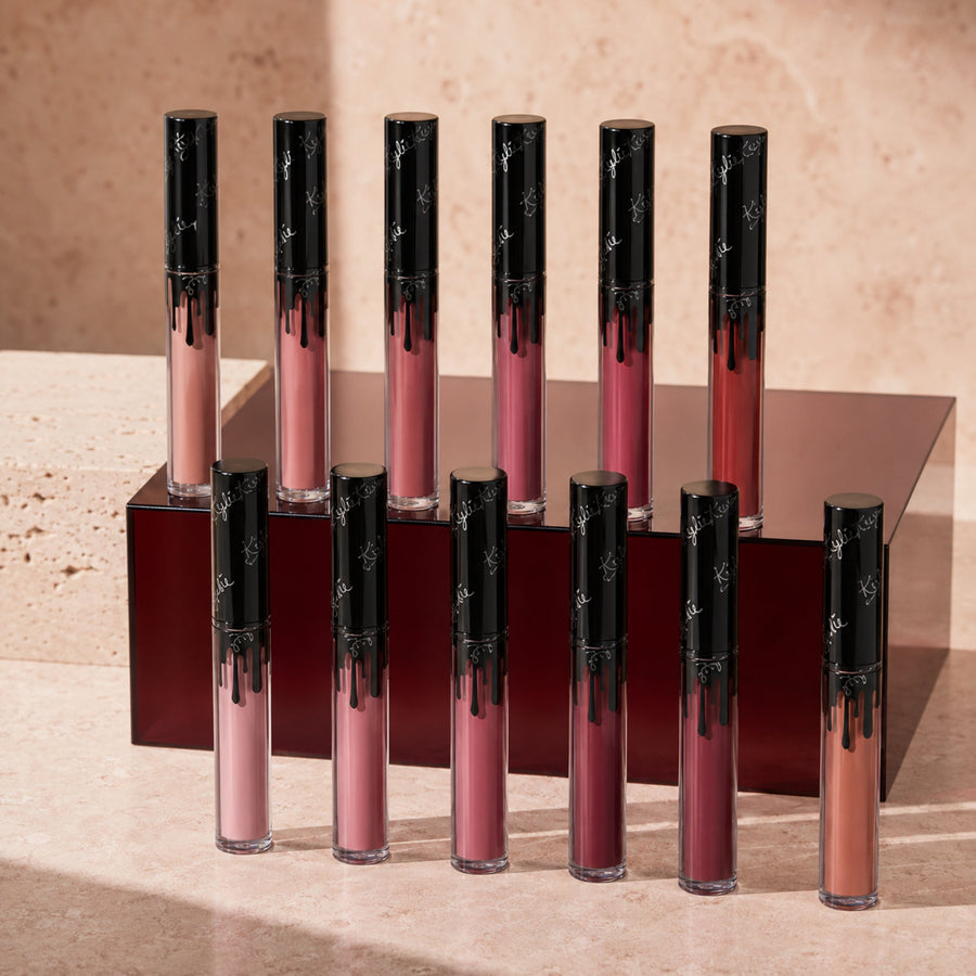 Twelve-piece matte lipstick collection in a warm beige three-quarter product shot