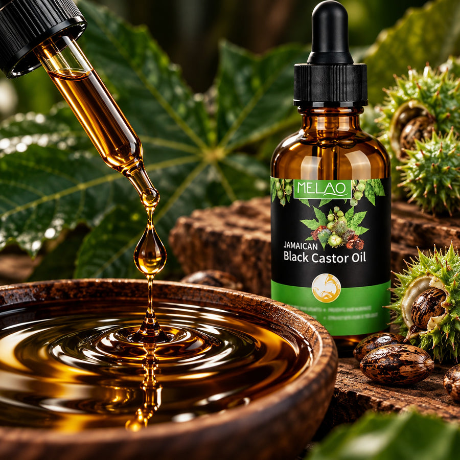 Thick dark amber Jamaican black castor oil dripping from the dropper