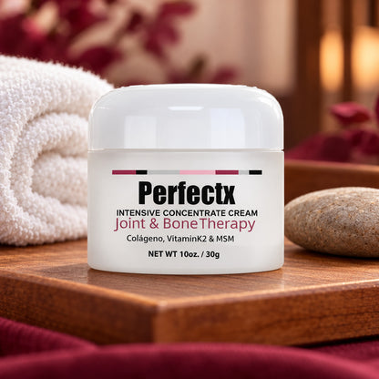 Perfectx Intensive Concentrate Cream 30g jar on a wooden spa tray with towel and river stone