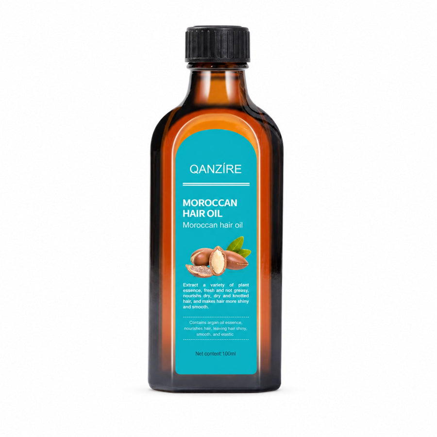 QANZIRE Moroccan Hair Oil bottle alone on white with a soft realistic shadow