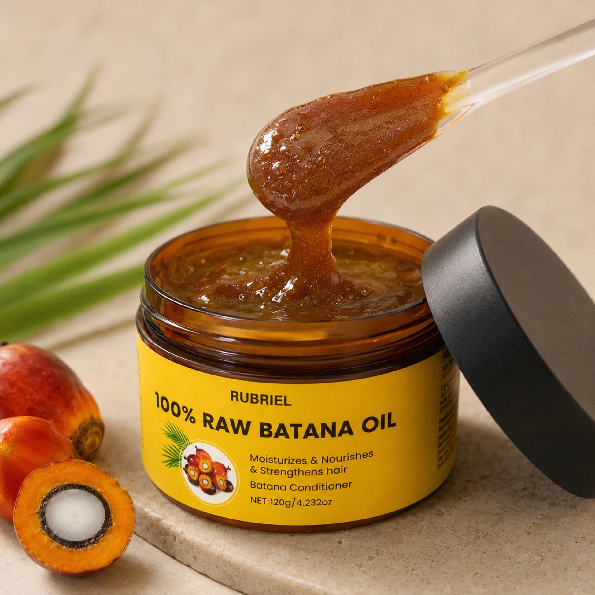 Open Rubriel Batana Oil jar showing its dense glossy amber-brown texture