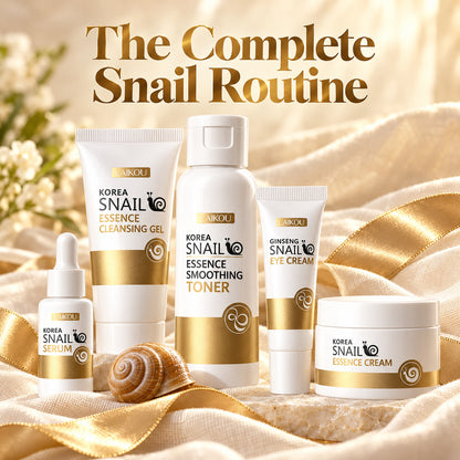 The complete snail routine – five LAIKOU products with a gold ribbon on cream linen