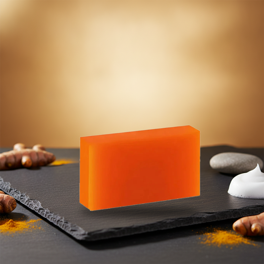 Turmeric & Kojic Acid soap bar styled on slate with fresh turmeric root