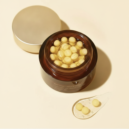 Deep Vita C Capsule Face Cream — macro detail of gold vitamin C capsules in open jar