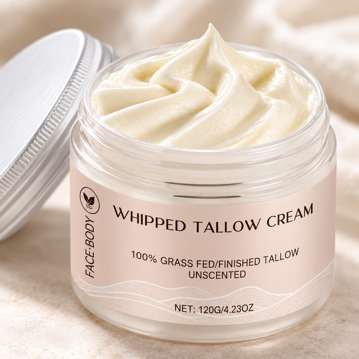 Close-up of the light, airy whipped tallow texture in the open jar