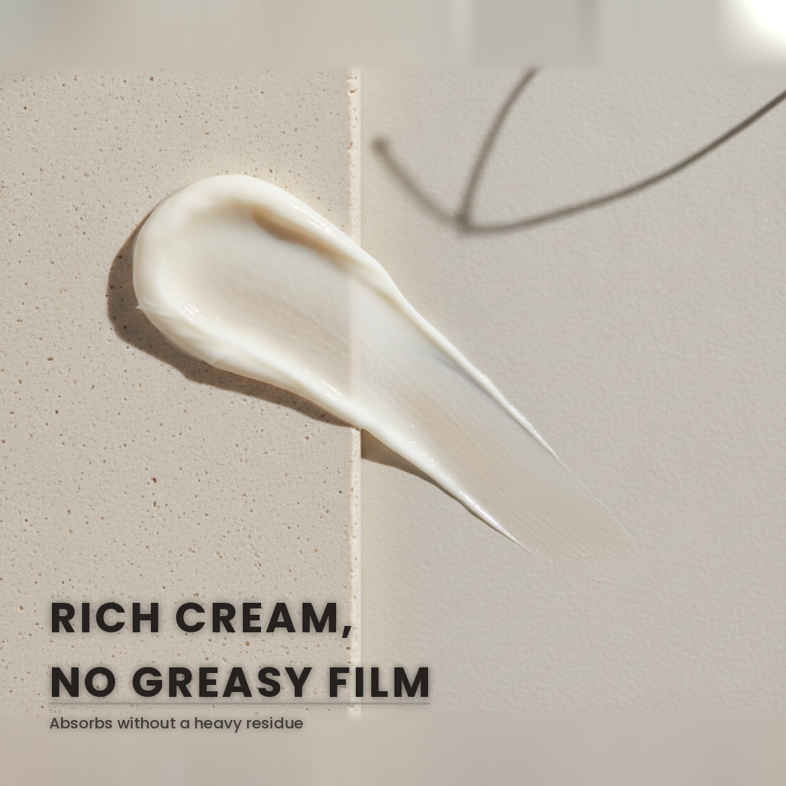 Macro of the rich white Wild Yam Cream smoothed into a thinning, non-greasy film on pale stoneware
