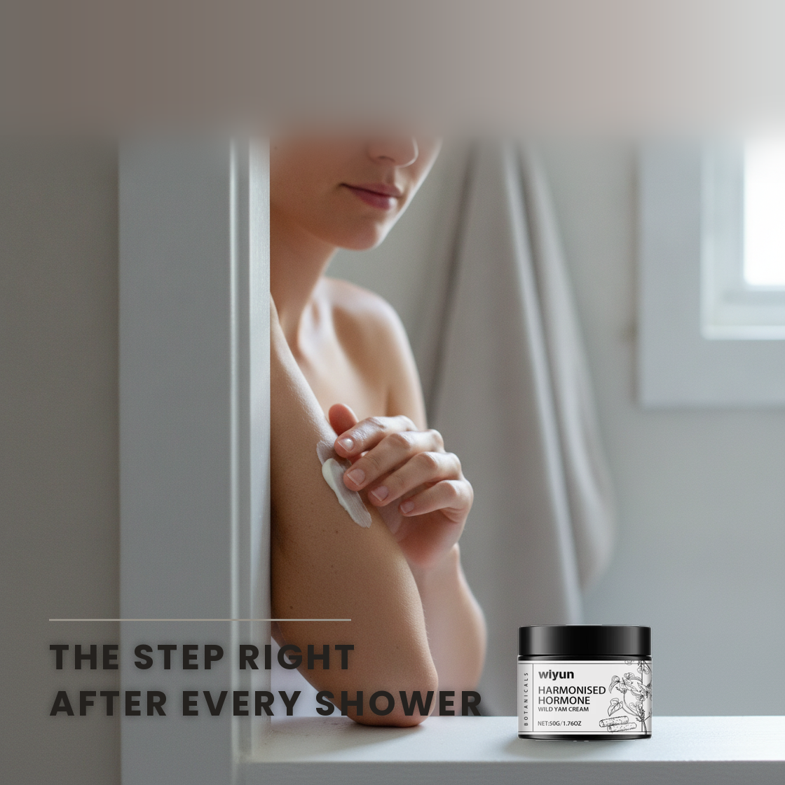 Smoothing Wild Yam Cream along the forearm after a shower, the closed jar on the bathroom ledge